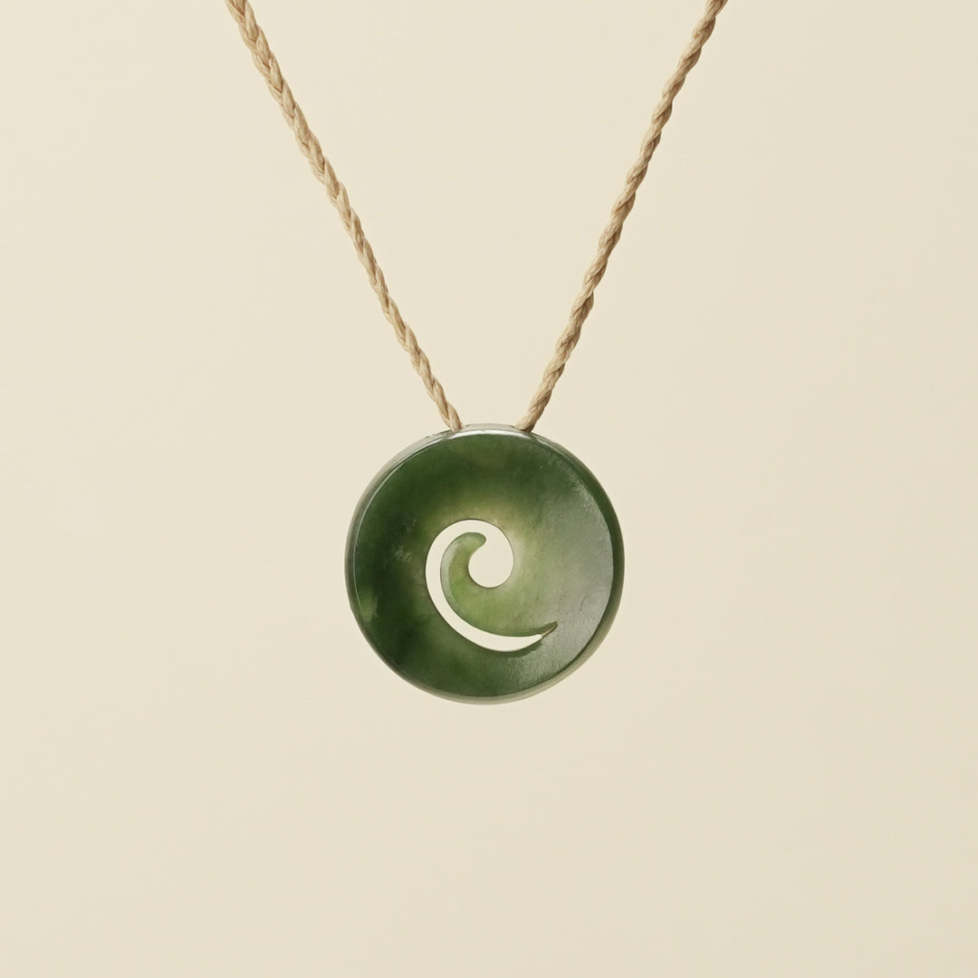 Koru Kawakawa Pounamu Pendant, Tan Binding