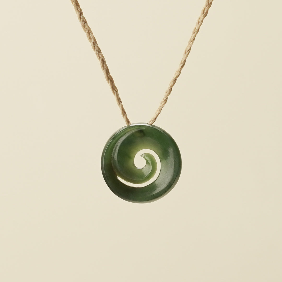 Koru Kawakawa Pounamu Pendant, Tan Binding