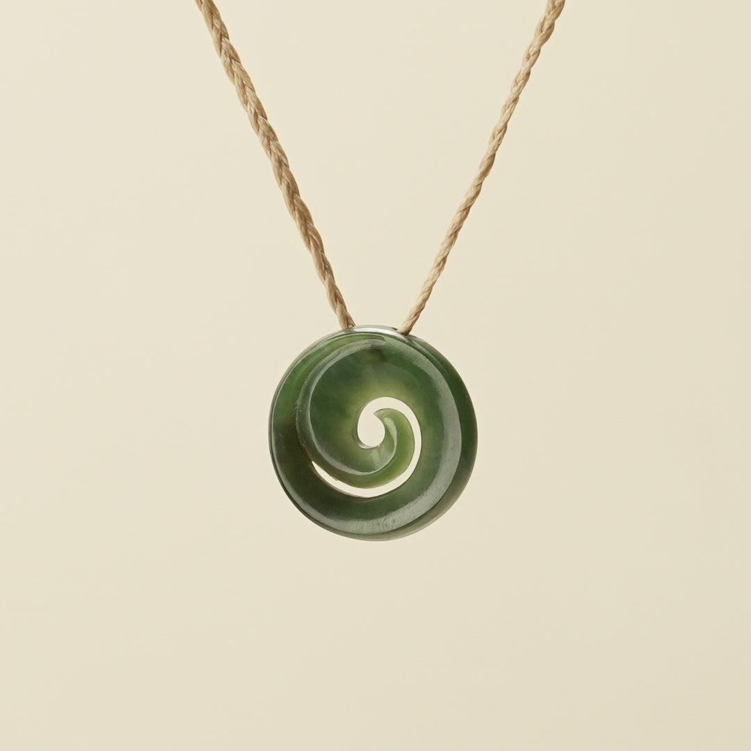 Koru Kawakawa Pounamu Pendant, Tan Binding