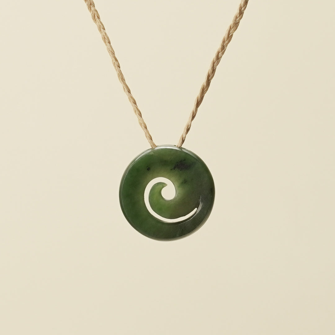 Koru Kawakawa Pounamu Pendant, Tan Binding