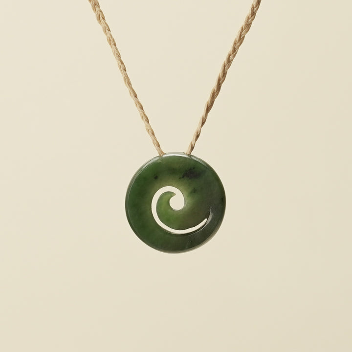Koru Kawakawa Pounamu Pendant, Tan Binding