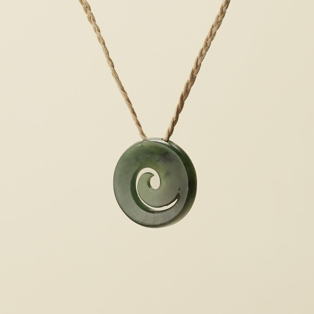 Koru Kawakawa Pounamu Pendant, Tan Binding