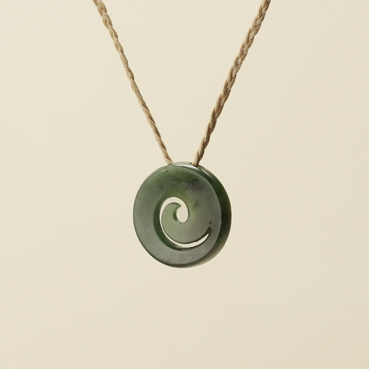 Koru Kawakawa Pounamu Pendant, Tan Binding