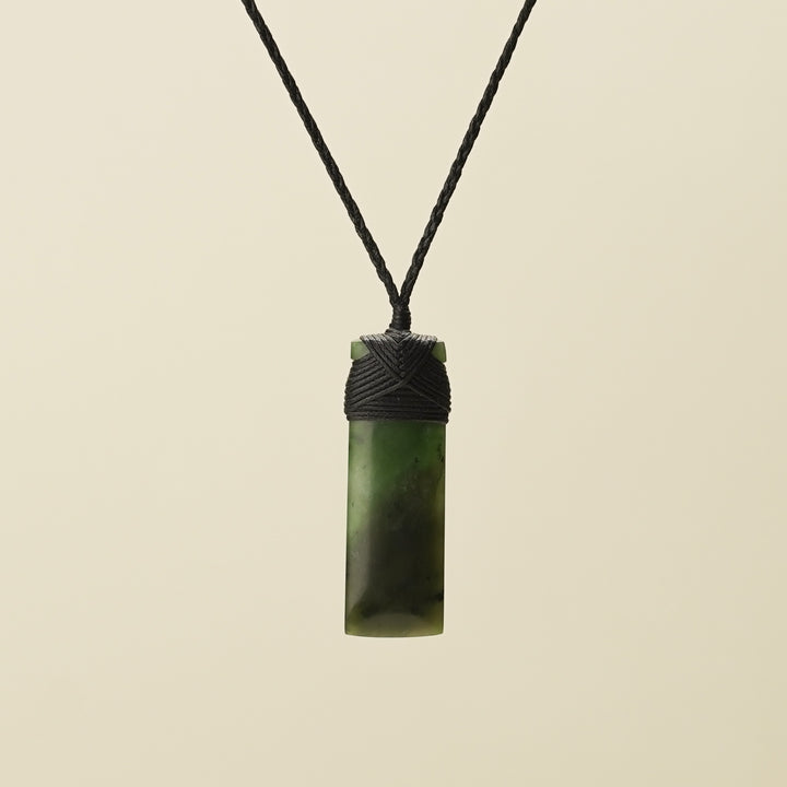 Kahurangi Kawakawa Toki Small Pounamu Pendant Black Binding