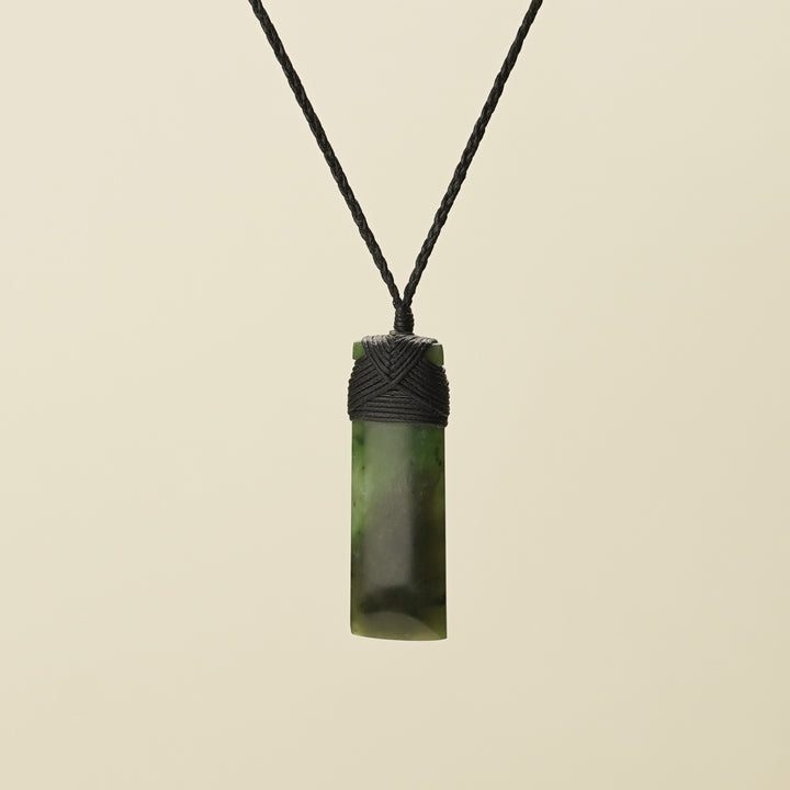 Kahurangi Kawakawa Toki Small Pounamu Pendant Black Binding