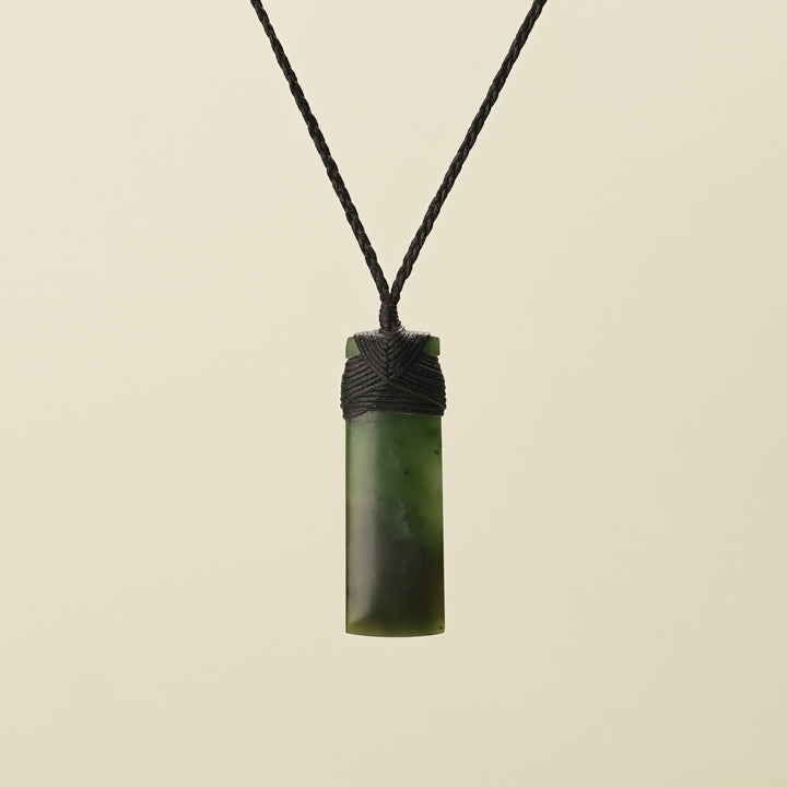 Kahurangi Kawakawa Toki Small Pounamu Pendant Black Binding