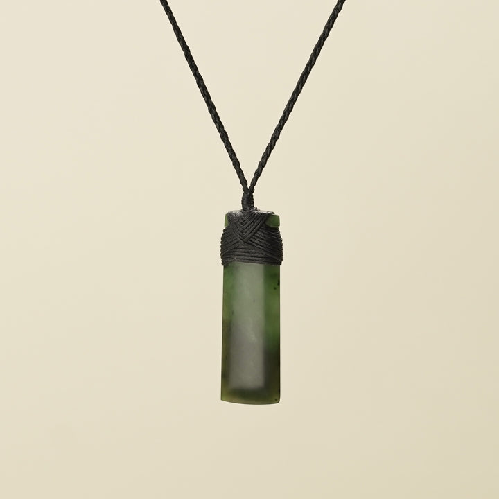 Kahurangi Kawakawa Toki Small Pounamu Pendant Black Binding