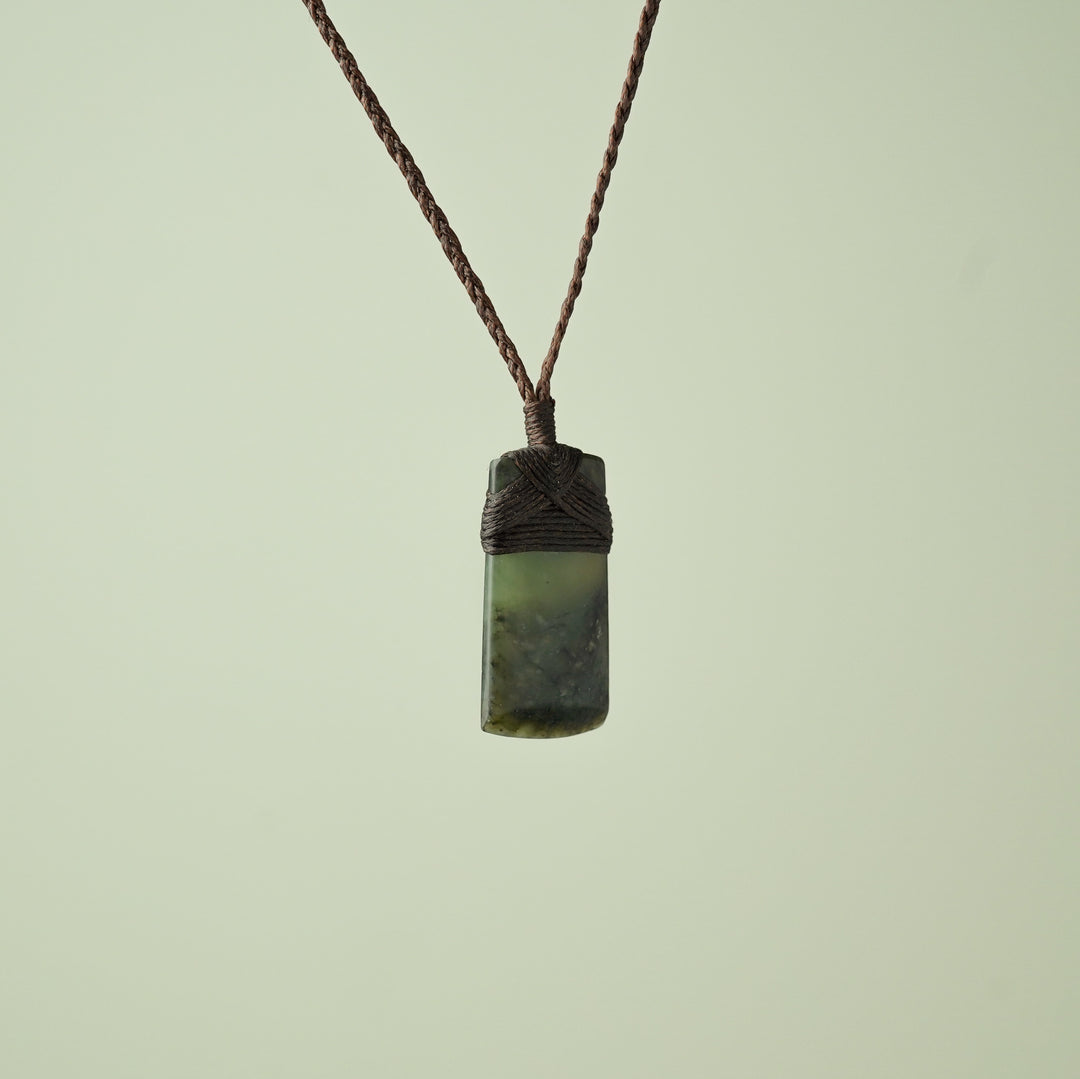 Small Kawakawa Pounamu Toki Pendant, Brown Binding