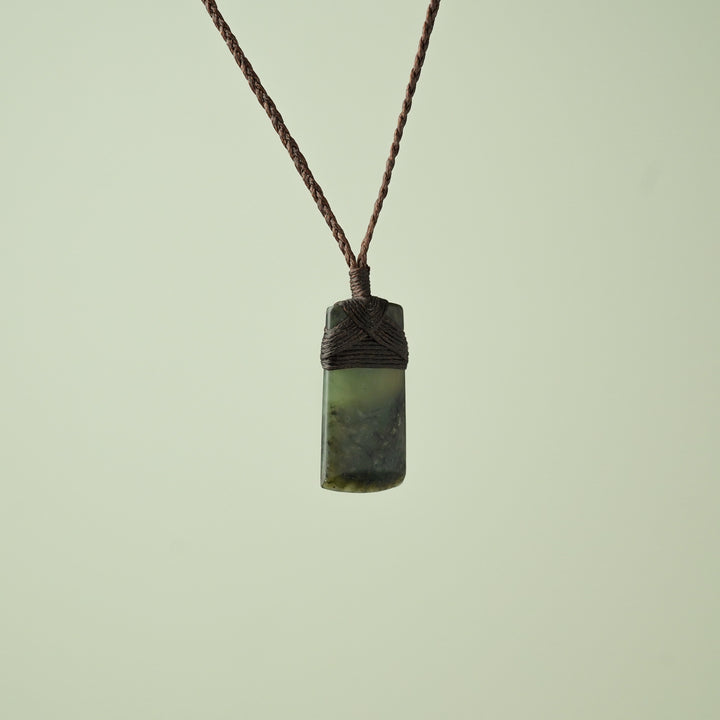 Small Kawakawa Pounamu Toki Pendant, Brown Binding