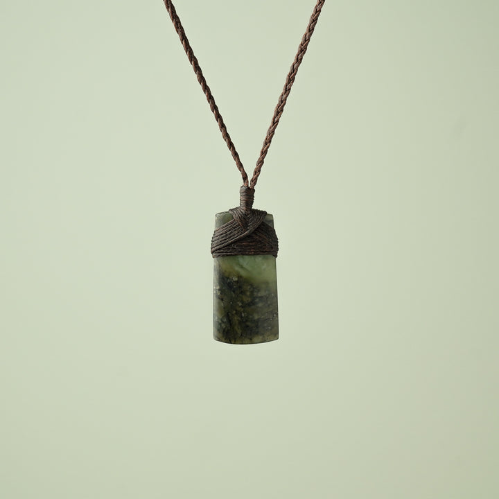 Small Kawakawa Pounamu Toki Pendant, Brown Binding