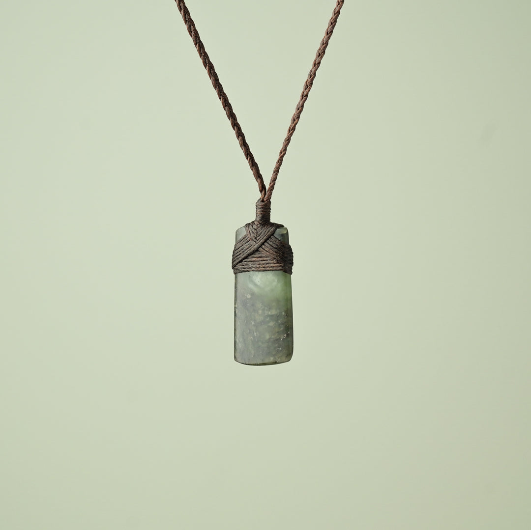 Small Kawakawa Pounamu Toki Pendant, Brown Binding