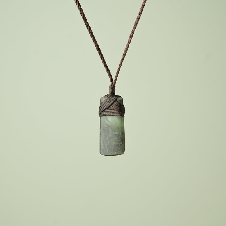 Small Kawakawa Pounamu Toki Pendant, Brown Binding
