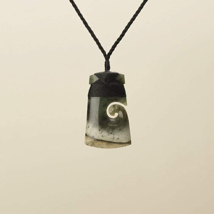 Medium Raukaraka Pounamu Toki with Koru Pendant