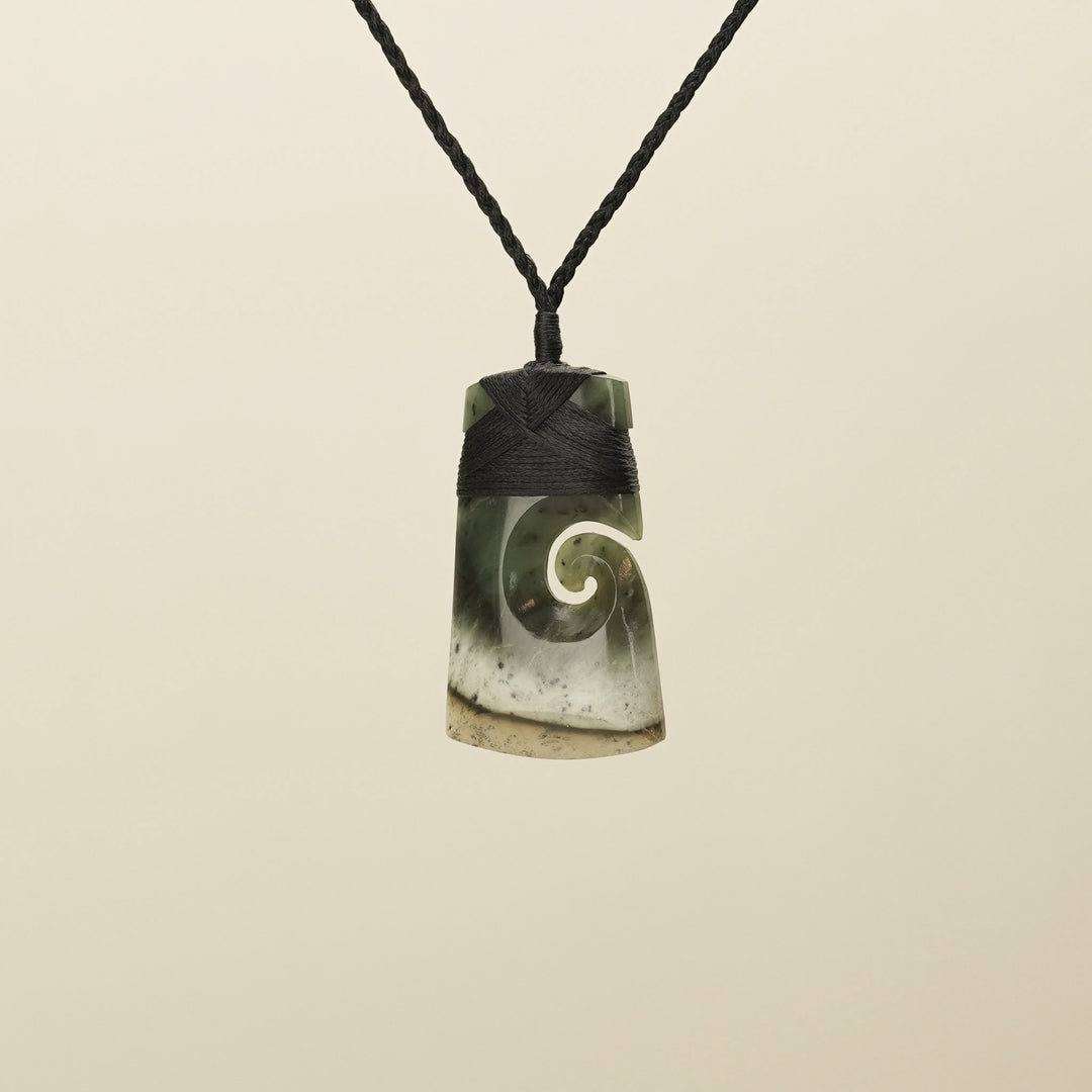 Medium Raukaraka Pounamu Toki with Koru Pendant