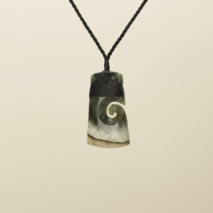 Medium Raukaraka Pounamu Toki with Koru Pendant