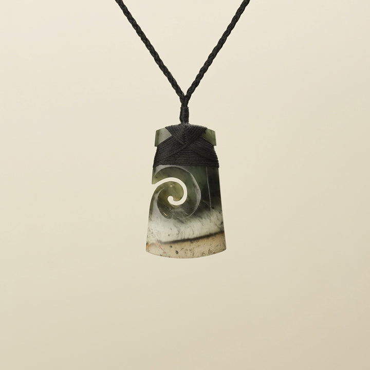 Medium Raukaraka Pounamu Toki with Koru Pendant