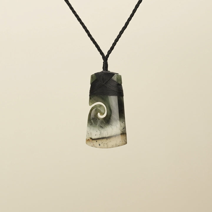 Medium Raukaraka Pounamu Toki with Koru Pendant