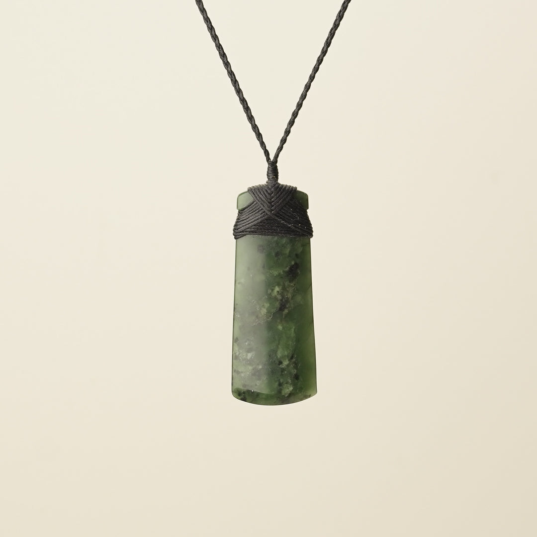 Toki Kawakawa Polished Pounamu – Medium Large, Black Binding