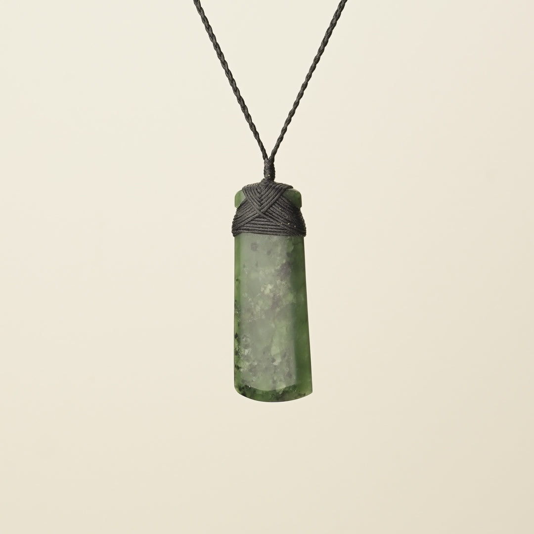 Toki Kawakawa Polished Pounamu – Medium Large, Black Binding