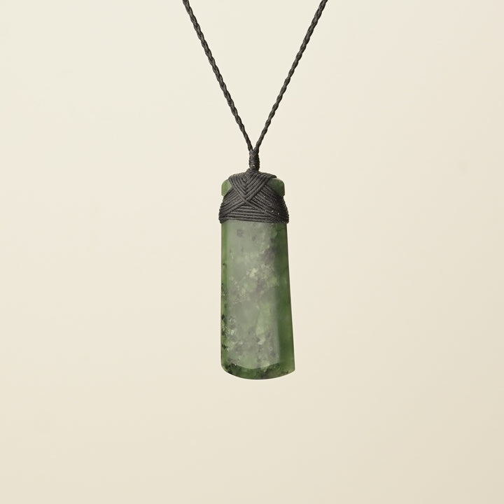 Toki Kawakawa Polished Pounamu – Medium Large, Black Binding