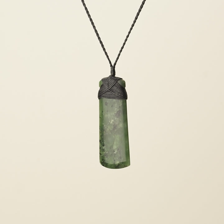 Toki Kawakawa Polished Pounamu – Medium Large, Black Binding
