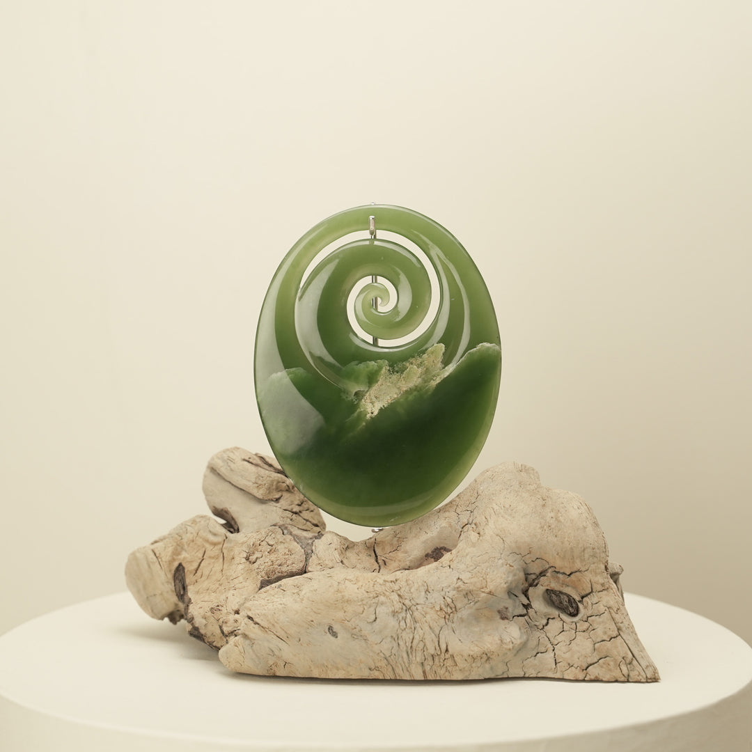 Koru Pounamu Sculpture on Wood Base