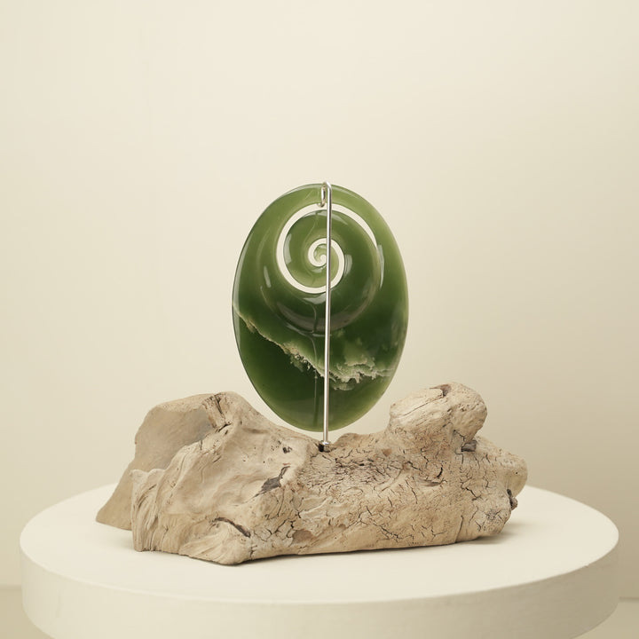 Koru Pounamu Sculpture on Wood Base