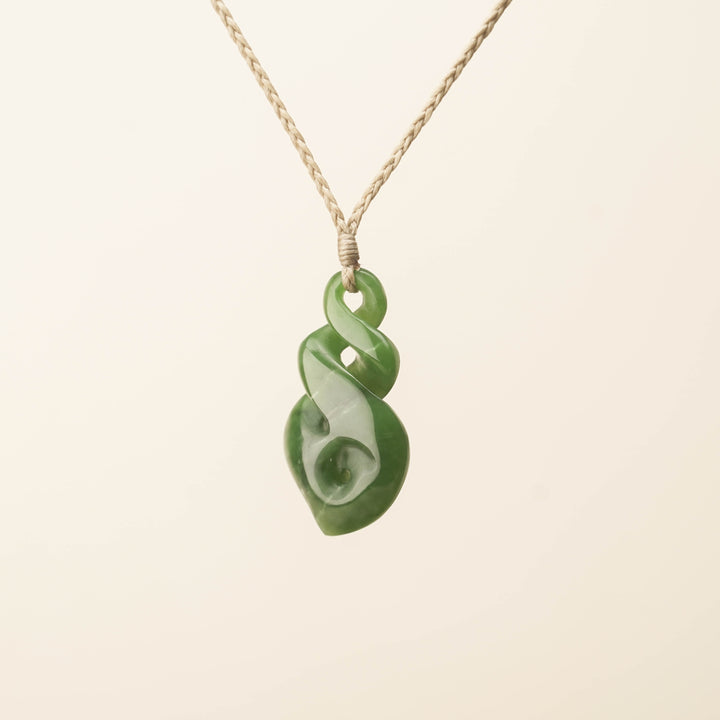 Kahurangi Pikorua Koru Pounamu Pendant, Tan Binding