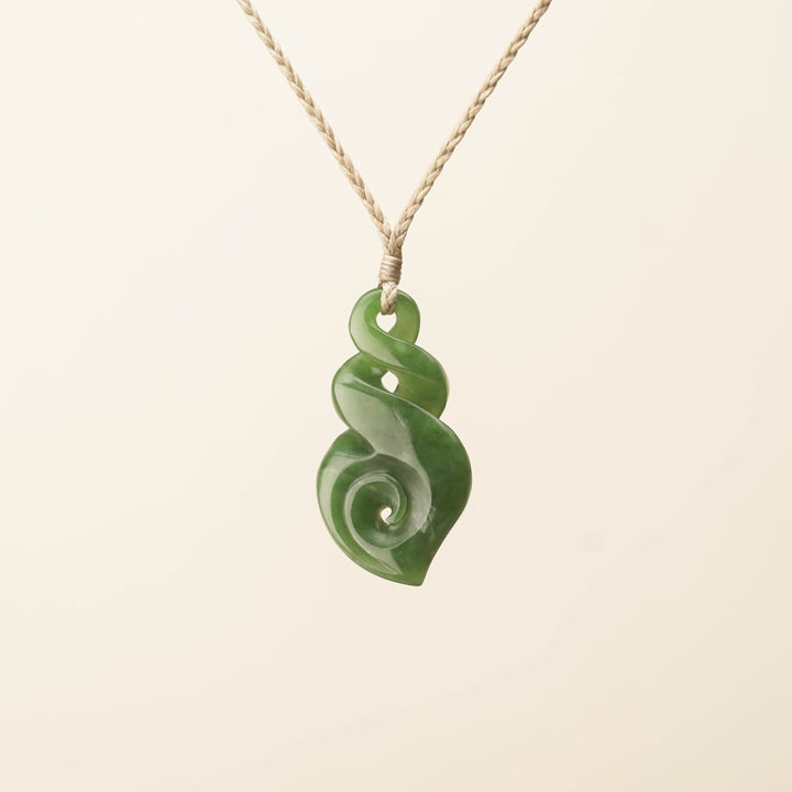 Kahurangi Pikorua Koru Pounamu Pendant, Tan Binding