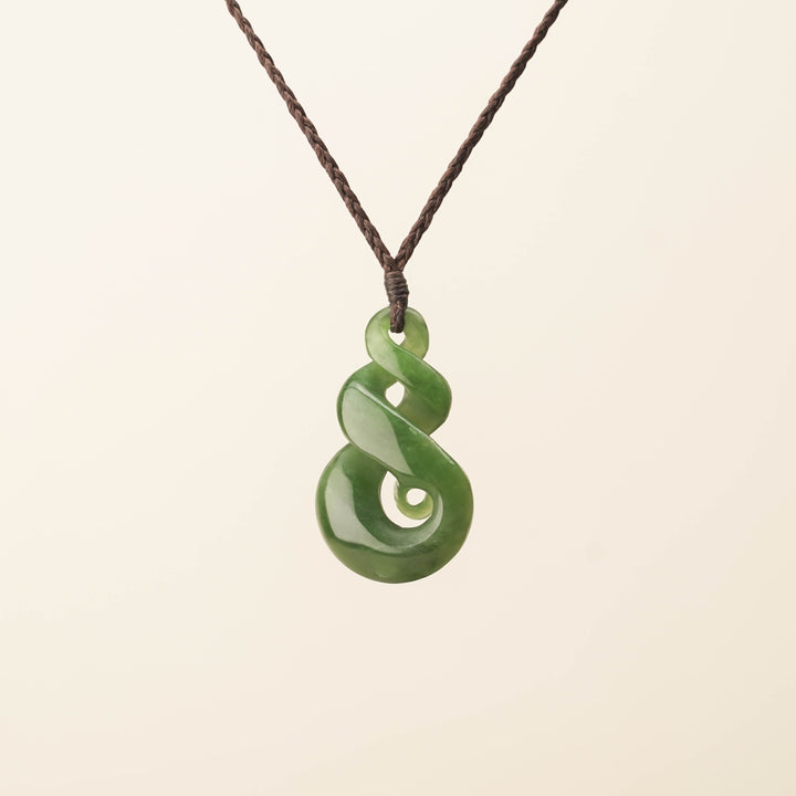 Kahurangi Pikorua Koru Pounamu Pendant, Brown Binding