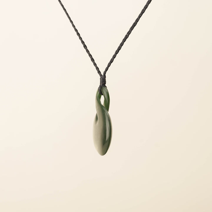 Flower Pikorua Medium Pounamu Pendant, Black Binding