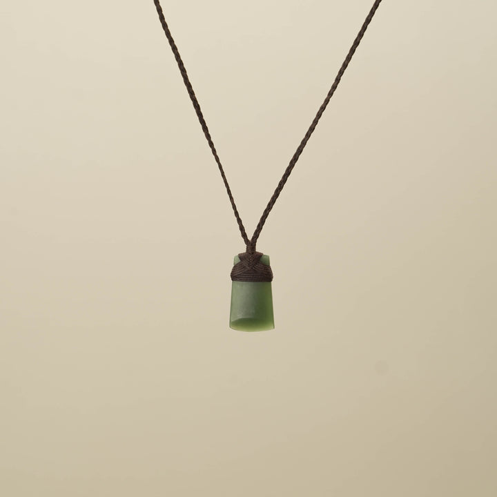 Kahurangi Inanga XS Toki Pounamu Pendant, Brown Binding