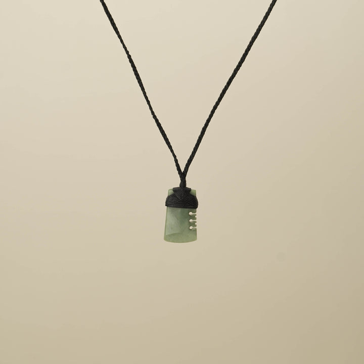 Inanga XS Notched Toki Pounamu Pendant, Black Binding