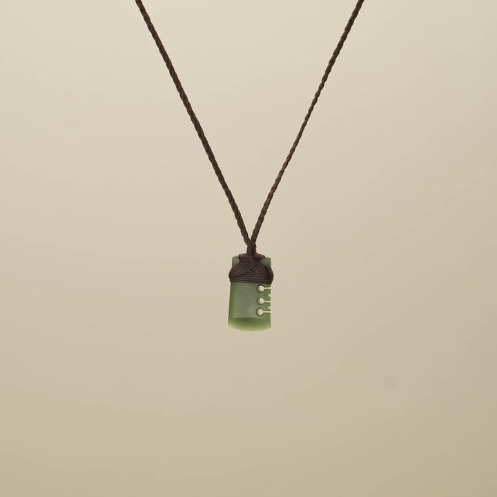 Kahurangi XS Notched Toki Pounamu Pendant, Brown Binding