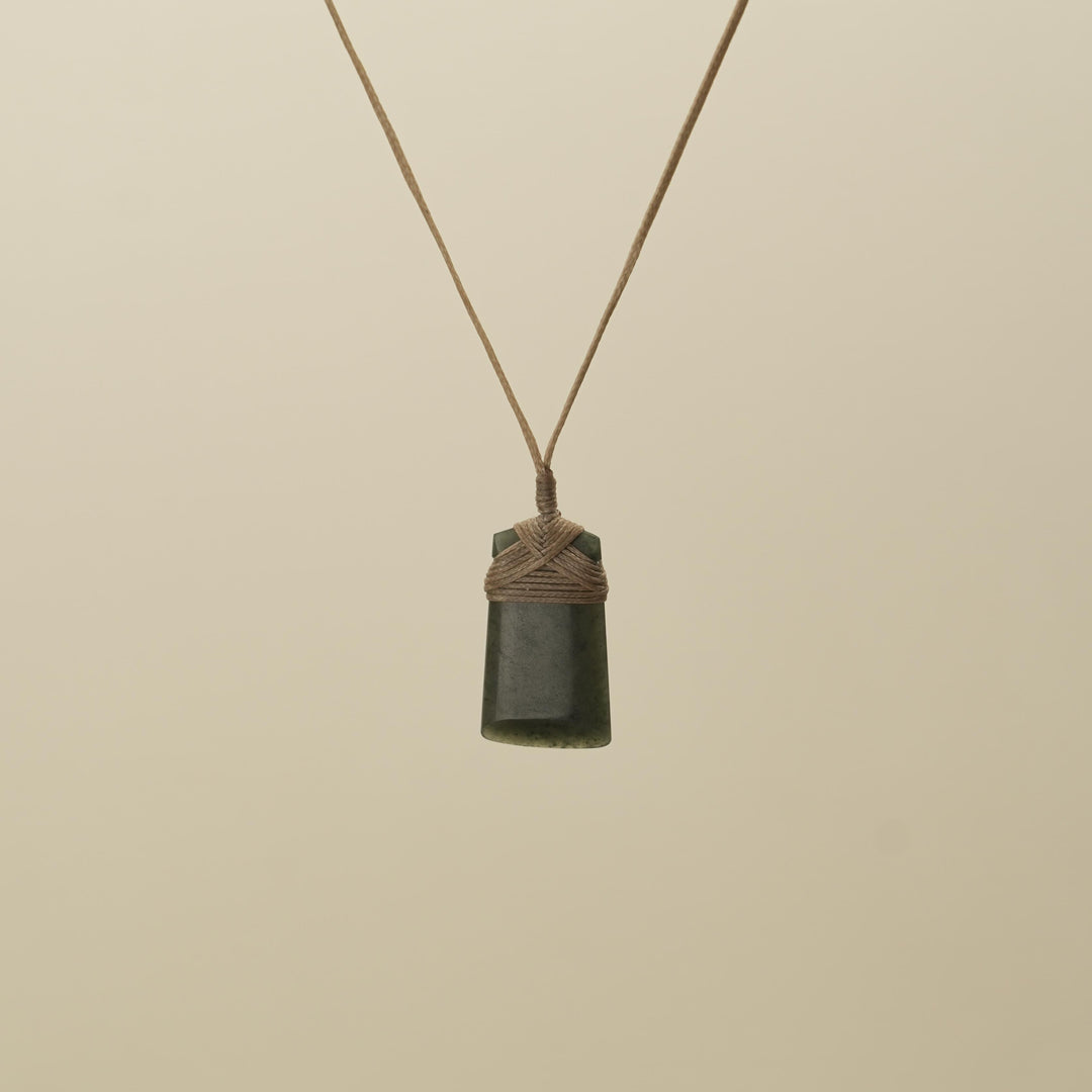 Tangiwai Small Toki Pounamu Pendant, Tan Binding