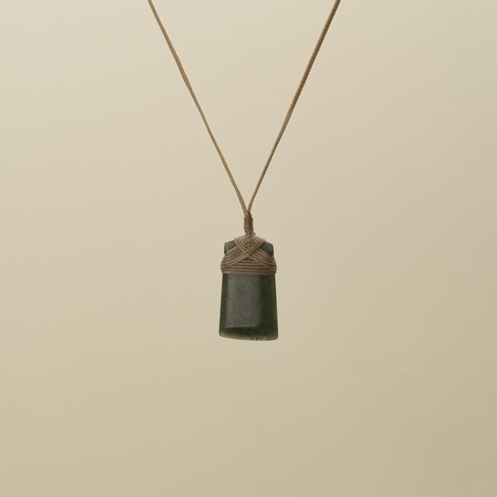 Tangiwai Small Toki Pounamu Pendant, Tan Binding
