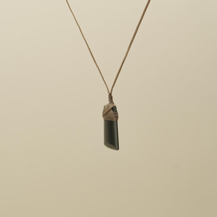 Tangiwai Small Toki Pounamu Pendant, Tan Binding