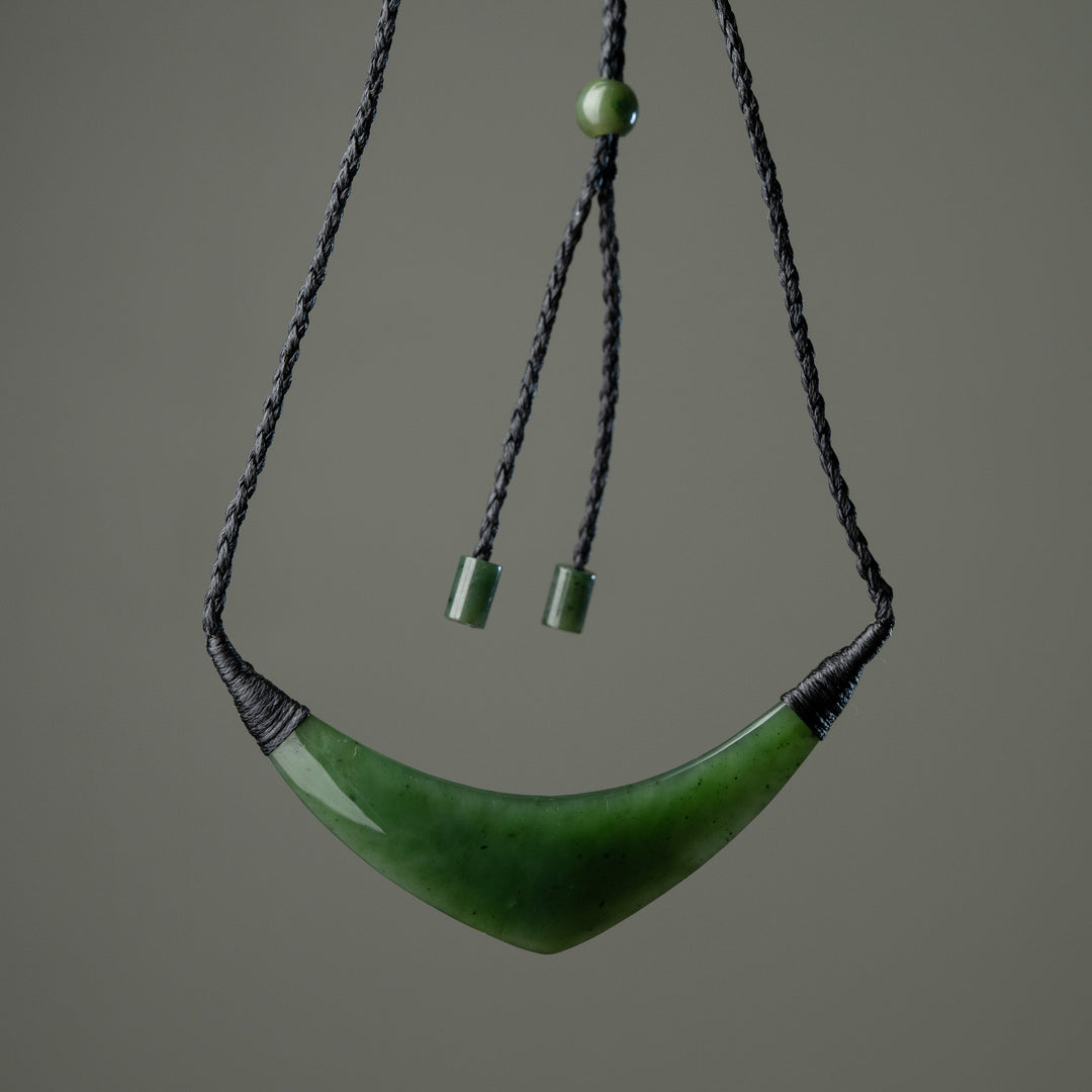 Curved greenstone beast plate