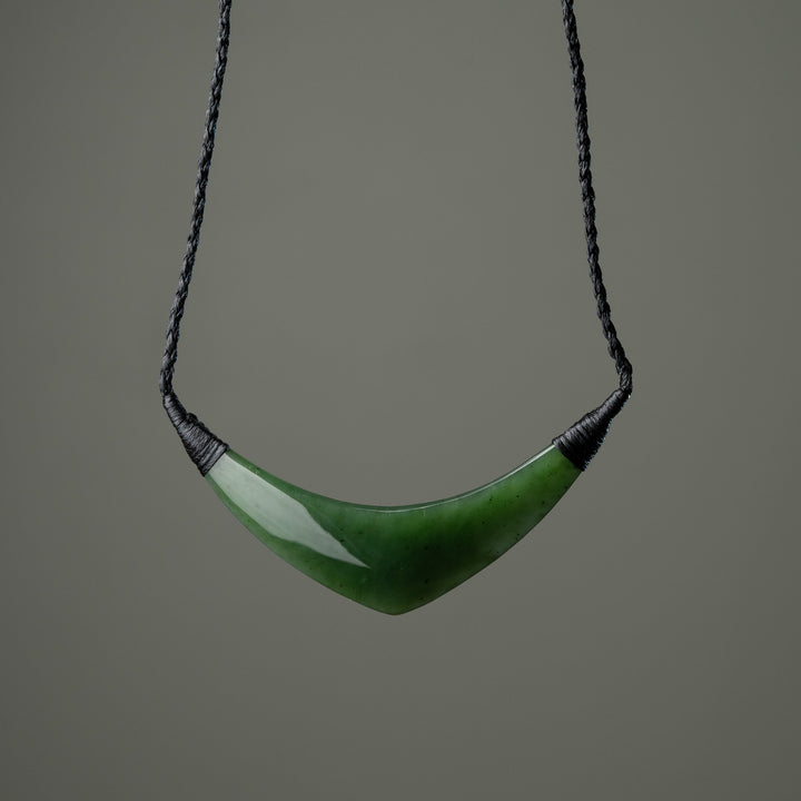 Curved greenstone beast plate