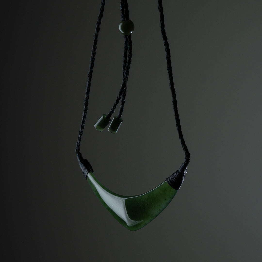 Curved greenstone beast plate