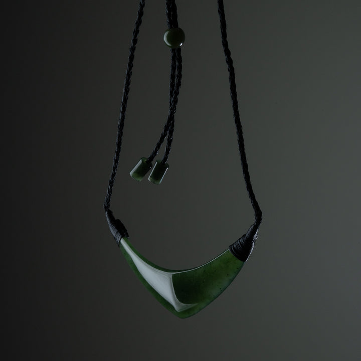 Curved greenstone beast plate
