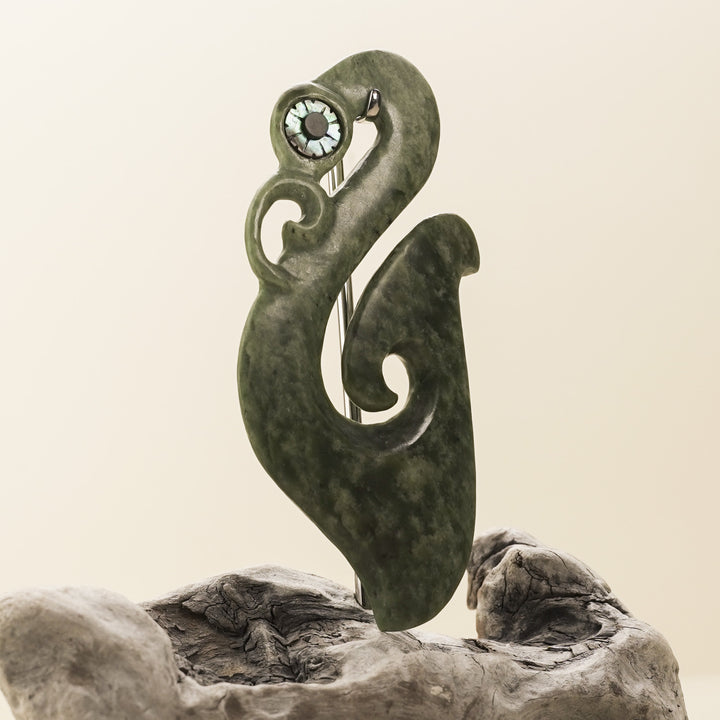 Manaia Kawakawa Pounamu Sculpture with Pāua Eye on Driftwood