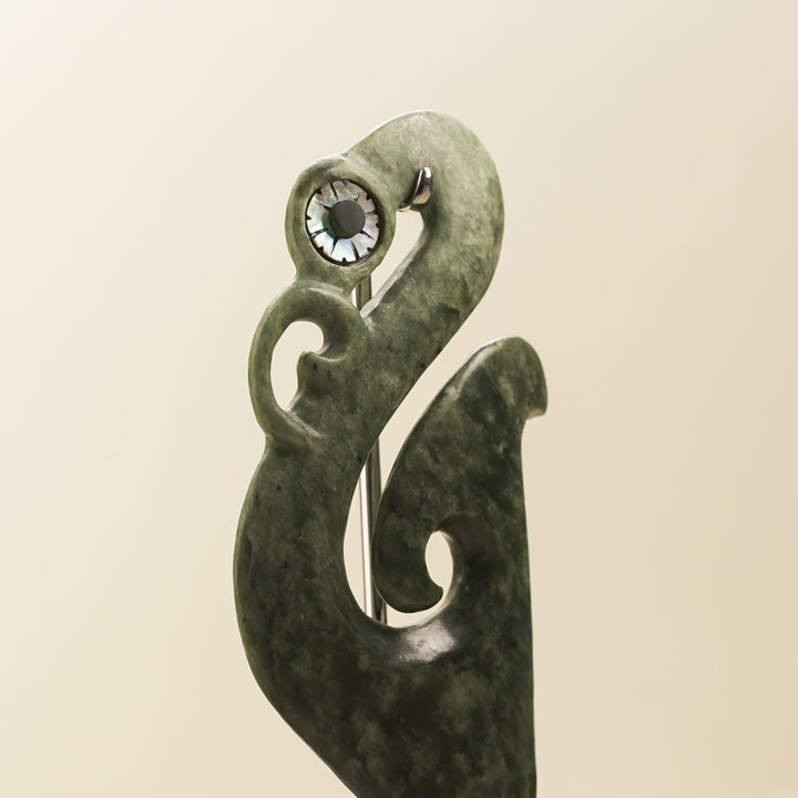 Manaia Kawakawa Pounamu Sculpture with Pāua Eye on Driftwood