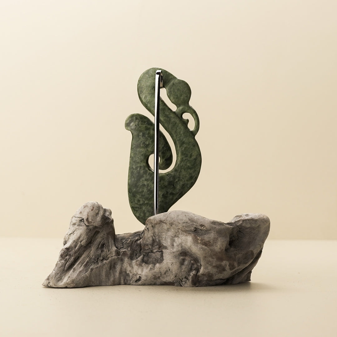 Manaia Kawakawa Pounamu Sculpture with Pāua Eye on Driftwood