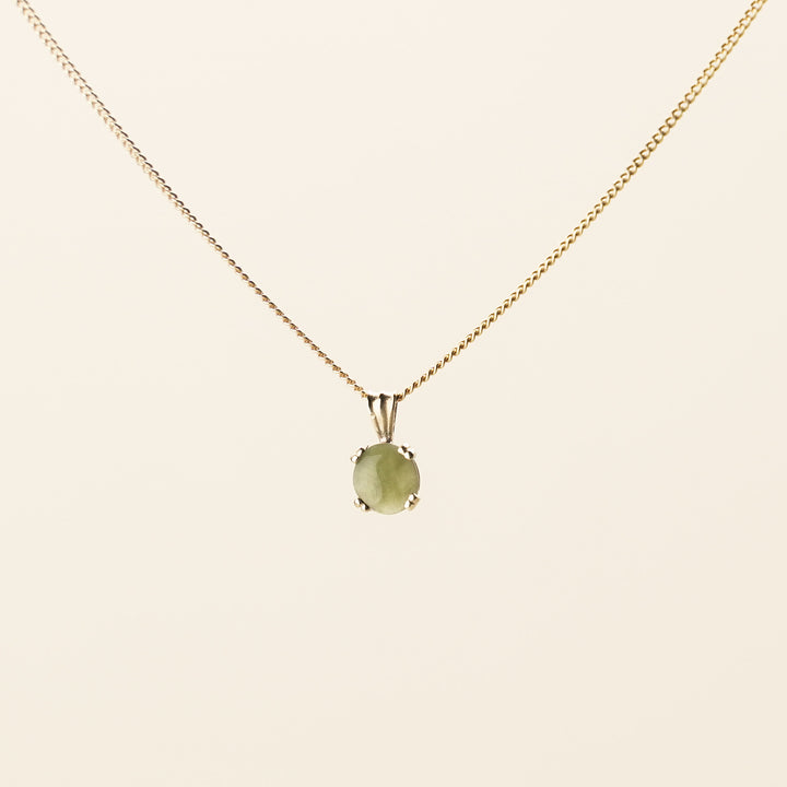 Pounamu Round Four-Claw 9k Gold Pendant