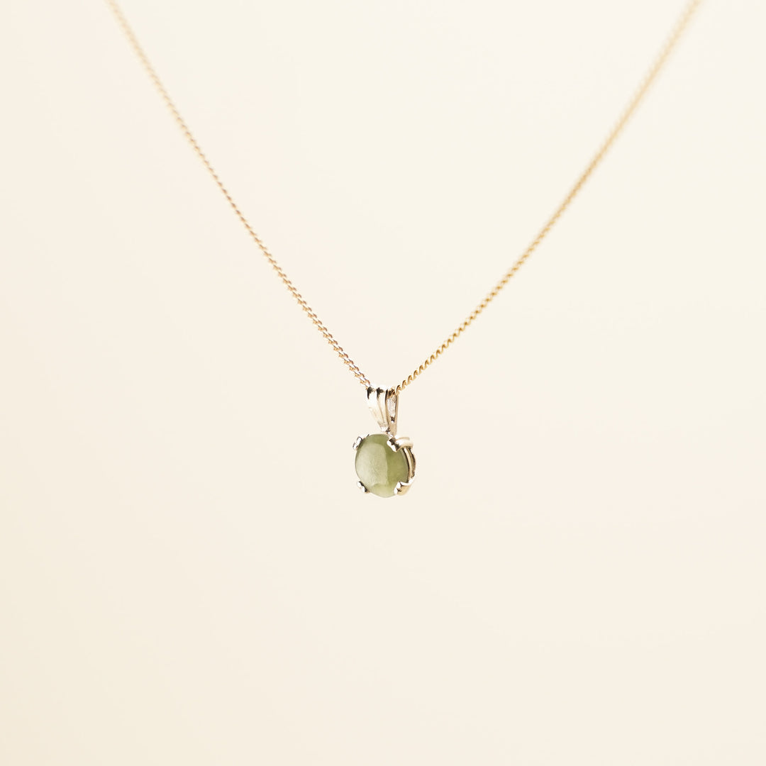 Pounamu Round Four-Claw 9k Gold Pendant