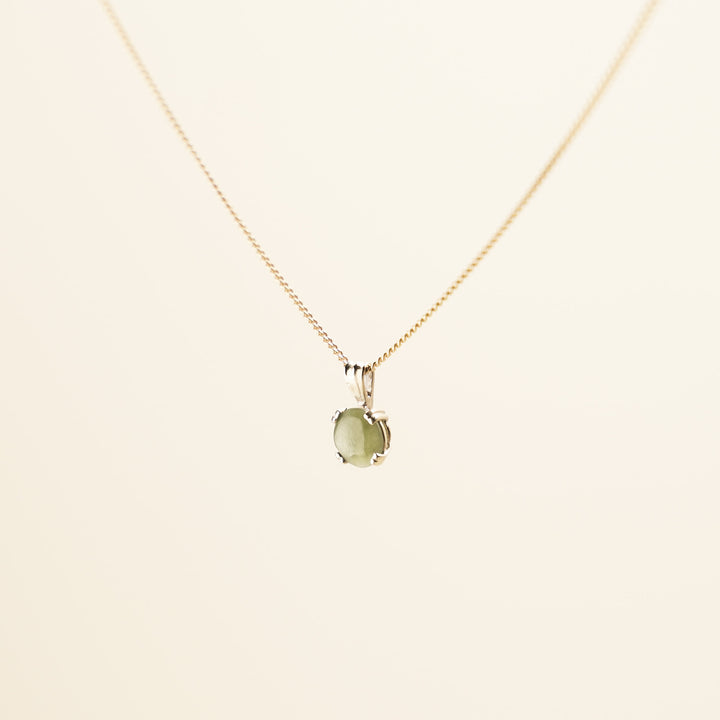 Pounamu Round Four-Claw 9k Gold Pendant