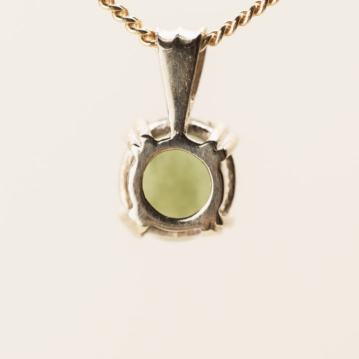Pounamu Round Four-Claw 9k Gold Pendant
