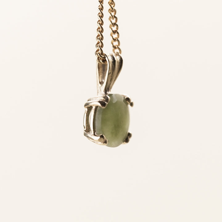 Pounamu Round Four-Claw 9k Gold Pendant